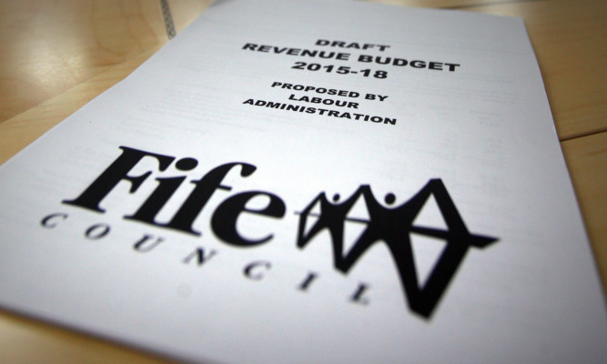 Kris Miller, Courier, 18/11/14. Picture today at Fife House, Glenrothes where the local council Executive Committee held a draft budget meeting for 2015/16 led by Council leader, Councillor David Ross. Pic shows a copy of the paper.