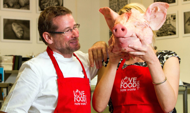 Andrew Fairlie and campaign co-ordinator Ylva Haglund holding a hogs head.