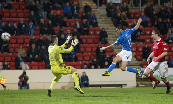 Brian Graham smashes an effort off the woodwork.