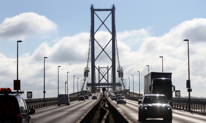 Traffic travelling over the Forth Road Bridge.