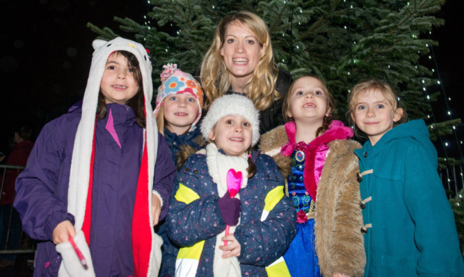 Eilidh Child with local youngsters.