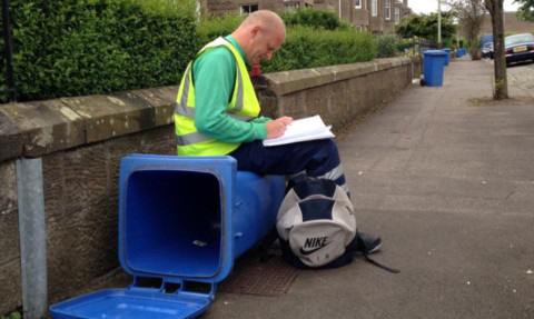 Gary Robertson writes scenes for his new play The Scaffies while on a tea break.