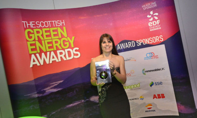 The sustainable development award in the Scottish Green Energy Awards was won by ScotAsh at Longannet Power Station. It was presented to Katrina Manson, ScotAshs finance business partner.