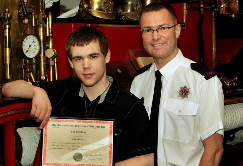 Tayside Fire and Rescue HQ, Dundee.  Ricci Foreman recieves award for trying to save the life of tragic murder victim Jessica McCagh.  Chief Fire Officer Stephen Hunter (right) and Ricci Foreman with his award.