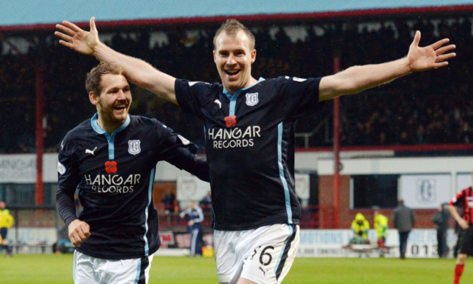 Dundee's David Clarkson (right) aims to equal a long-standing club record this weekend.