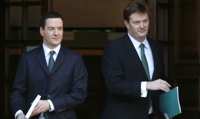 Chancellor George Osborne and Chief Secretary of the Treasury Danny Alexander head to Parliament for the Autumn Statement.