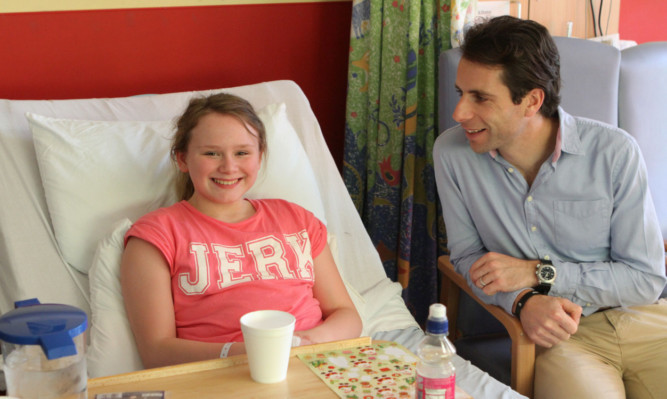 Mark chats with Charlotte Campbell during his visit to the childrens hospital.