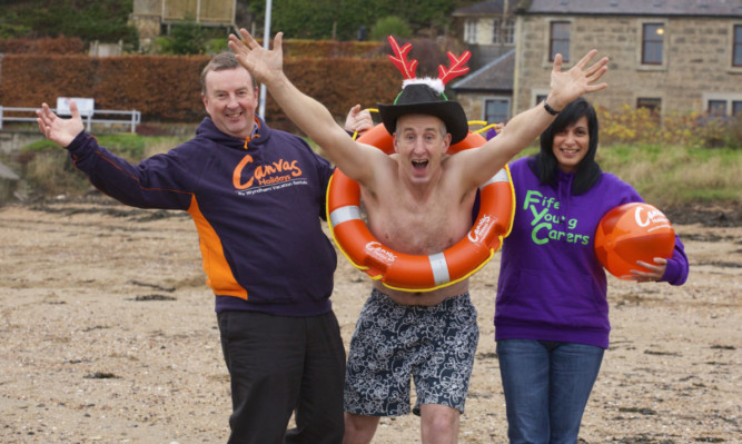 Splashing news: Simon Allan, Alex Hill and Nina Collins of Fife Young Carers.