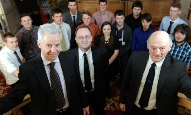 Front, from left: Andrew Moir, Peter Wood, training manager at Ringlink, and Graham Bruce with this years interns.