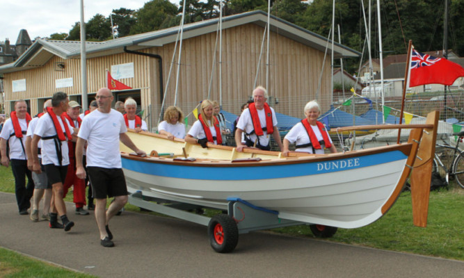 The skiff Brochty is piped on its way to the river at the Royal Tay Yacht Club in Broughty Ferry in August. Now a call has gone out to build a similar skiff in Montrose.