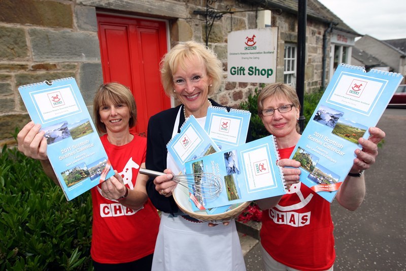 Steve MacDougall, Courier, CHAS Gift Shop, Avenue Road, Kinross. TV presenter and cookery queen Sue Lawrence launches CHAS calendar for 2011. Pictured, left to right is Frances Todd (Gift Shop Manager), Sue Lawrence and Pauline Tanbini (CHAS Retail Manager).