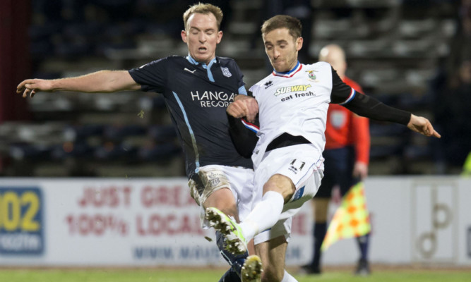 Gary Irvine in action against Inverness.