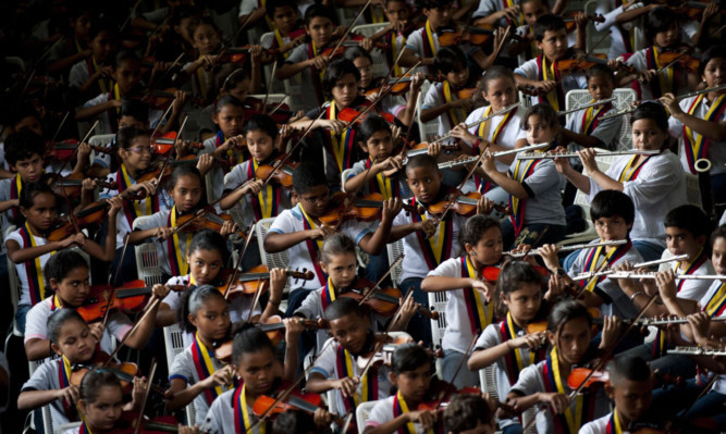 El Sistema musicians peform at a concert in Caracas, Venezeula.