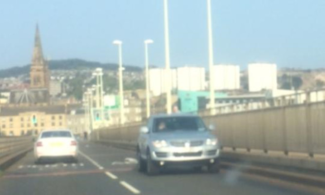 James Davidson driving on the wrong side of the carriageway on the Tay bridge.