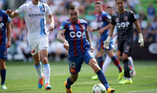 Newcastle Jets' player Jonny Steele in action against Melbourne City.