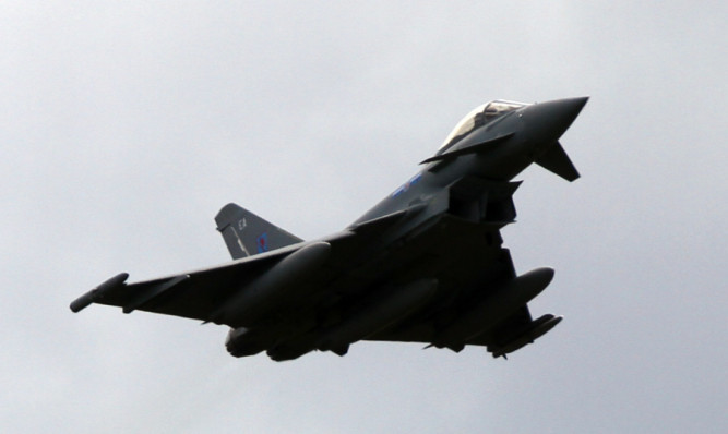 Kris Miller, Courier, 09/05/12. Picture today at RAF Leuchars shows a Typhoon taking off.