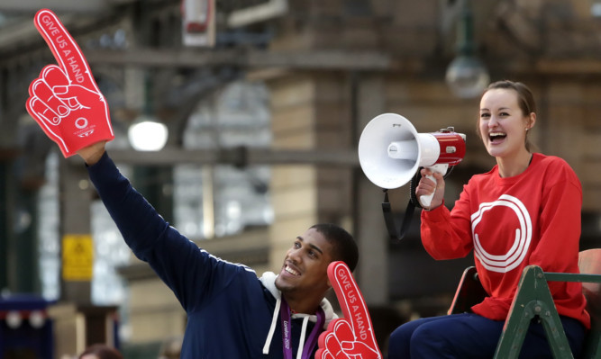 Olympic gold medalist Anthony Joshua and Olympic badminton player Susan Egelstaff launch the search for volunteers in January.