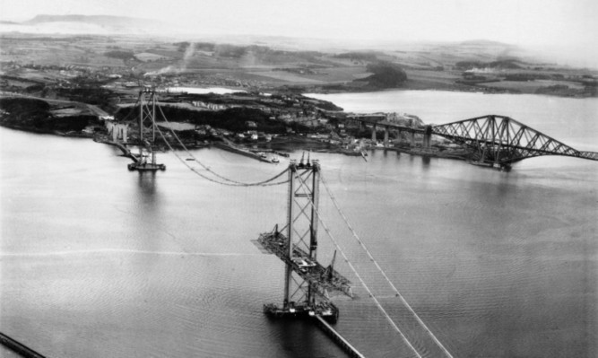 The Forth Road Bridge under construction.