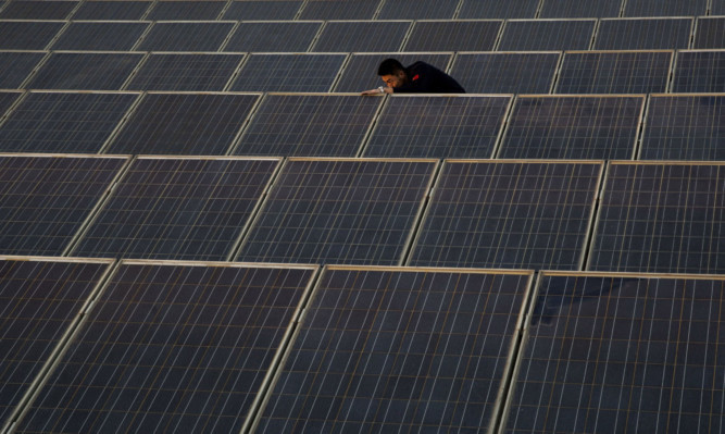 A solar energy farm being installed.