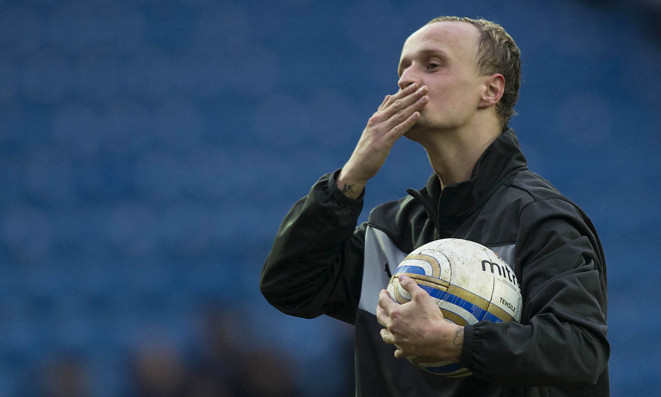 Leigh Griffiths claims the match ball after his first professional hat-trick.