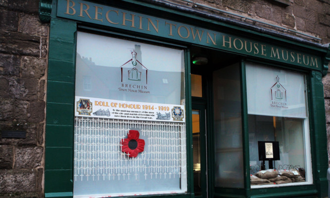 The commemorative display in the window of Brechin Town House Museum.