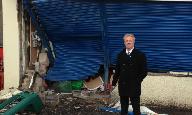 Councillor John OBrien outside the damaged Spar store in East Wemyss.