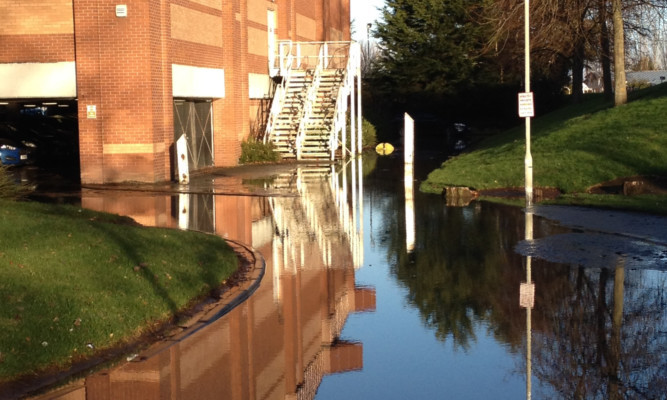 Flood water in the car park at the Dewars Centre.