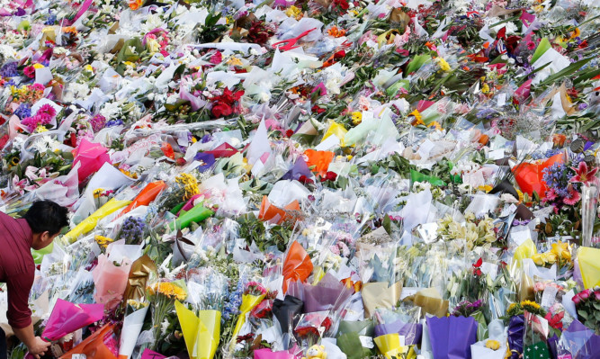 A sea of flowers laid in Sydney in tribute to the victims of the siege.