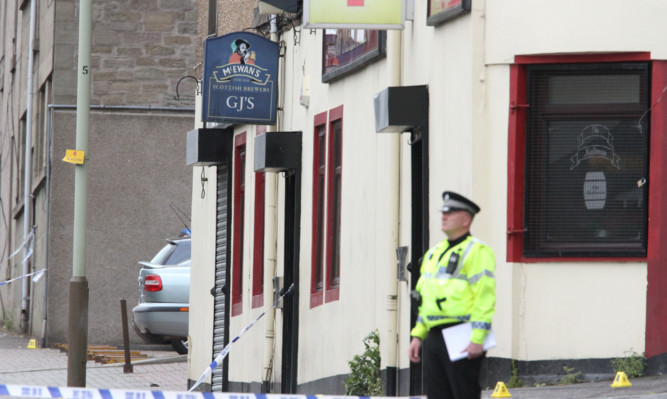Police outside the Maltman pub after last June's attack.