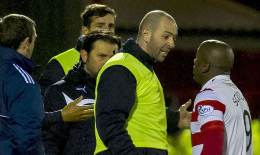 The incident between Gary Harkins and Jason Scotland that led to the Dundee player's dismissal.