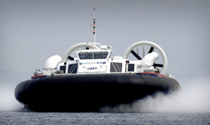 A hovercraft speeds across the Forth during the previous trial.