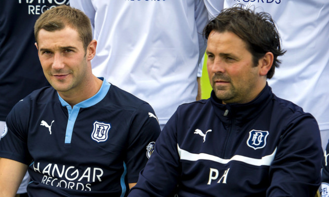 Kevin Thomson (left) and boss Paul Hartley.