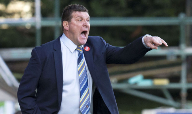 St Johnstone manager Tommy Wright gives instructions from the touchline