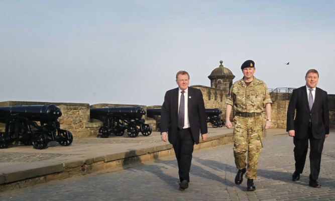 MP David Mundell, Major General Nick Eeles and Minister for Defence Personnel Welfare and Veterans Mark Francois at Edinburgh Castle after a press conference regarding the basing review.