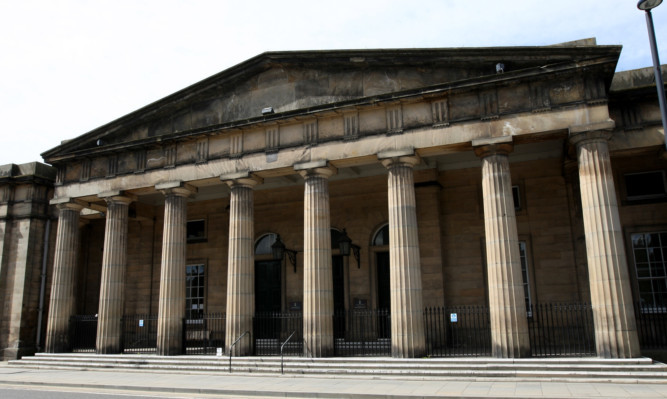 Nicolle Richardson appeared at Perth Sheriff Court after attacking the police officers during a Hogmanay drinking binge.