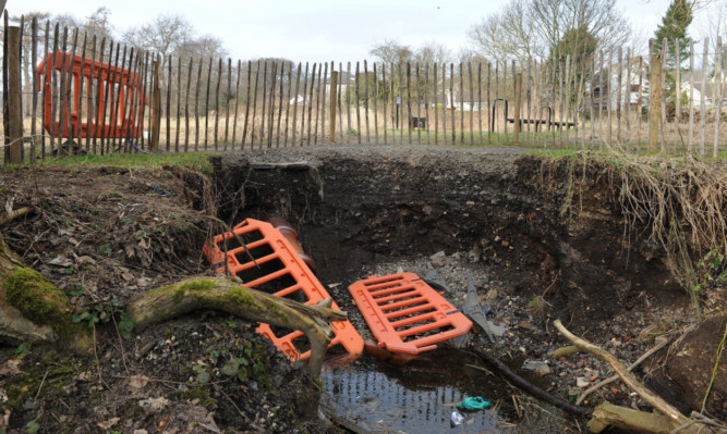 Kim Cessford - 05.03.13 - pictured is the collapsed walkway around Trottick Pond which is to be fixed by the council with a £2000 spend