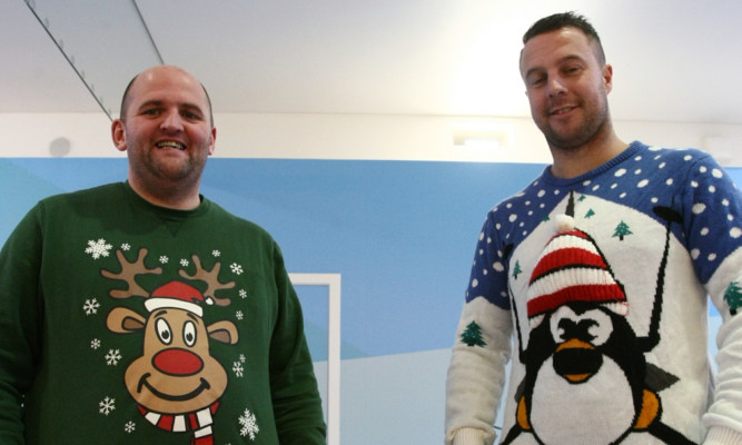 Alan Glynn, left, and Billy Carle were at the St Johns Shopping Centre in Perth on Saturday, collecting for Meningitis Now.