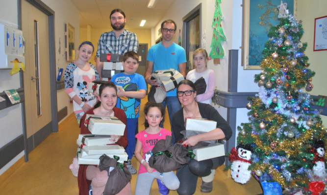 Amazon staff with some of the youngsters on the Childrens Ward, from left, Rebecca Stein, Cody Graham, Abbie Stevenson, and Erin Martin.