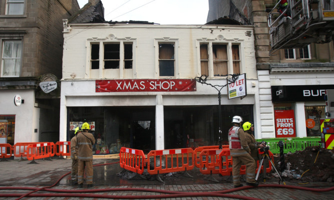 Firefighters at the Christmas Shop in Dundee's Murraygate.
