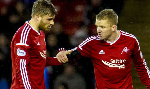 David Goodwillie cuts a dejected figure after being substituted alongside Jonny Hayes.