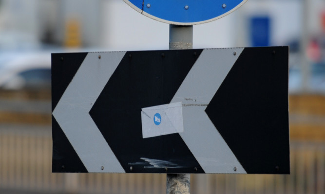 A referendum sticker on a junction box at the Glasgow Road/Riggs Road roundabout in Perth.