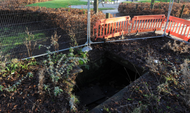 The fenced-off collapsed culvert in Haugh Park, Cupar.