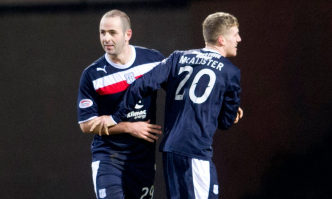 Gary Harkins (left) congratulates Jim McAlister on his equaliser at Dens Park on Wednesday night.