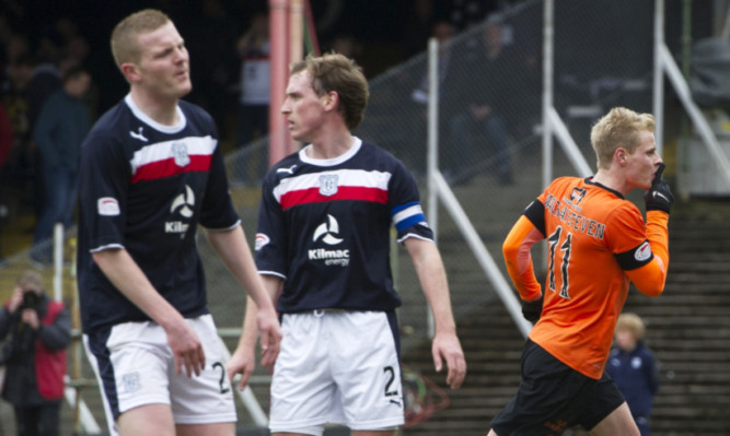 Gary Mackay-Steven celebrates his winning goal in Sunday's derby, which was watched by Scotland manager Gordon Strachan.