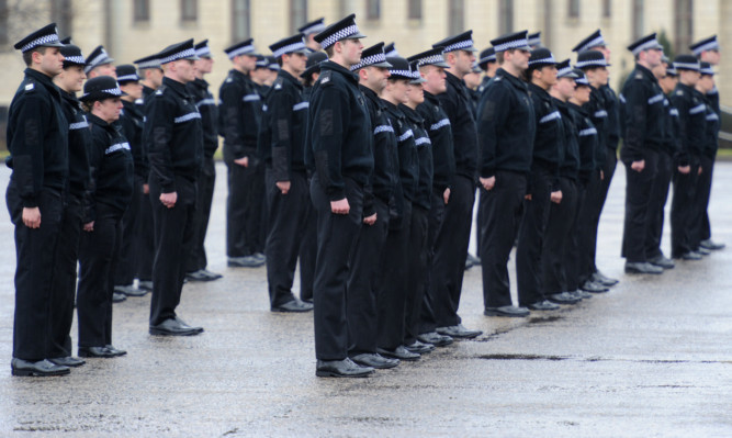 Kim Cessford - 08.03.13 - pictured at the final 'passing out' parade of Police recruits ahead of Police Scotland forming at the Scottish Police College,Tulliallan, Kincardine - part of the parade