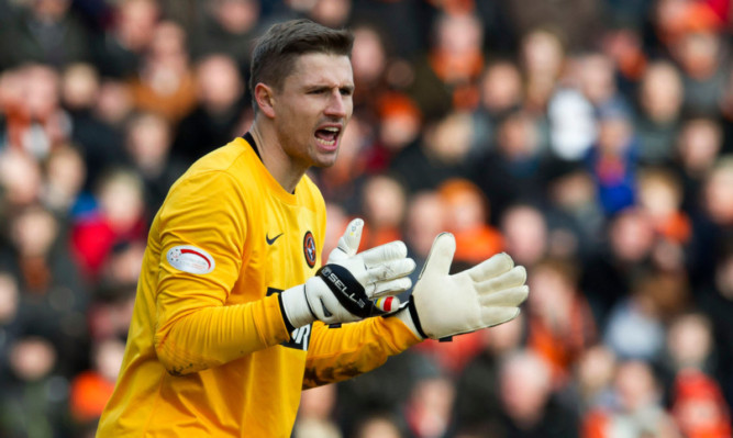 Radoslaw Cierzniak in action for Dundee United.