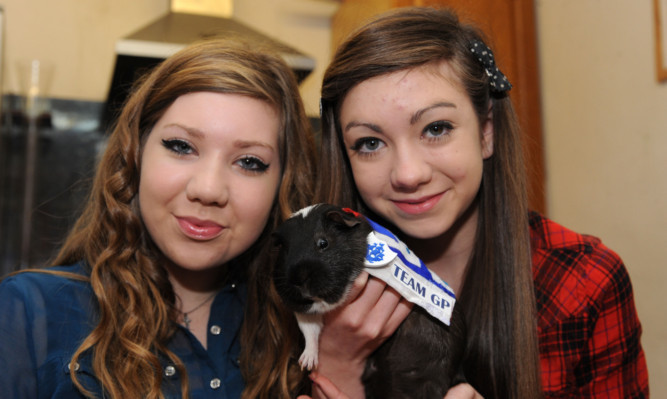 Nicole (15) and Chloe (14) with Truffles.