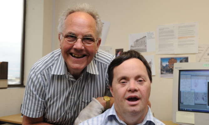 George Stewart, of the Kemback Action Group, and son David.