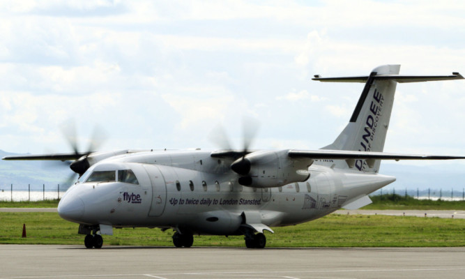 A Flybe Stanstead flight at Dundee Airport. Later evening departures from Dundee and London are intended to ensure that business travellers can make the most of their working day.