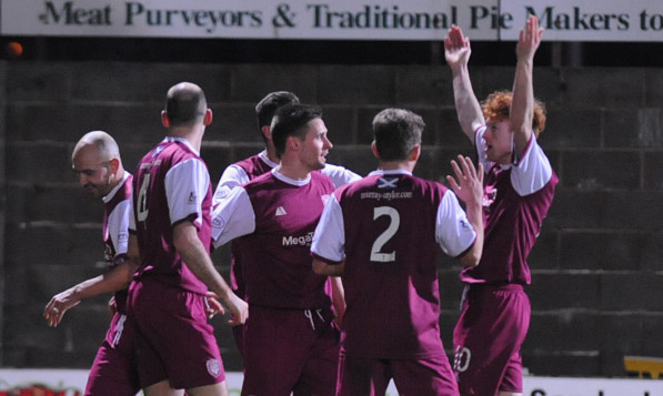 Hat-trick hero Simon Murray celebrates with his Arbroath team-mates.